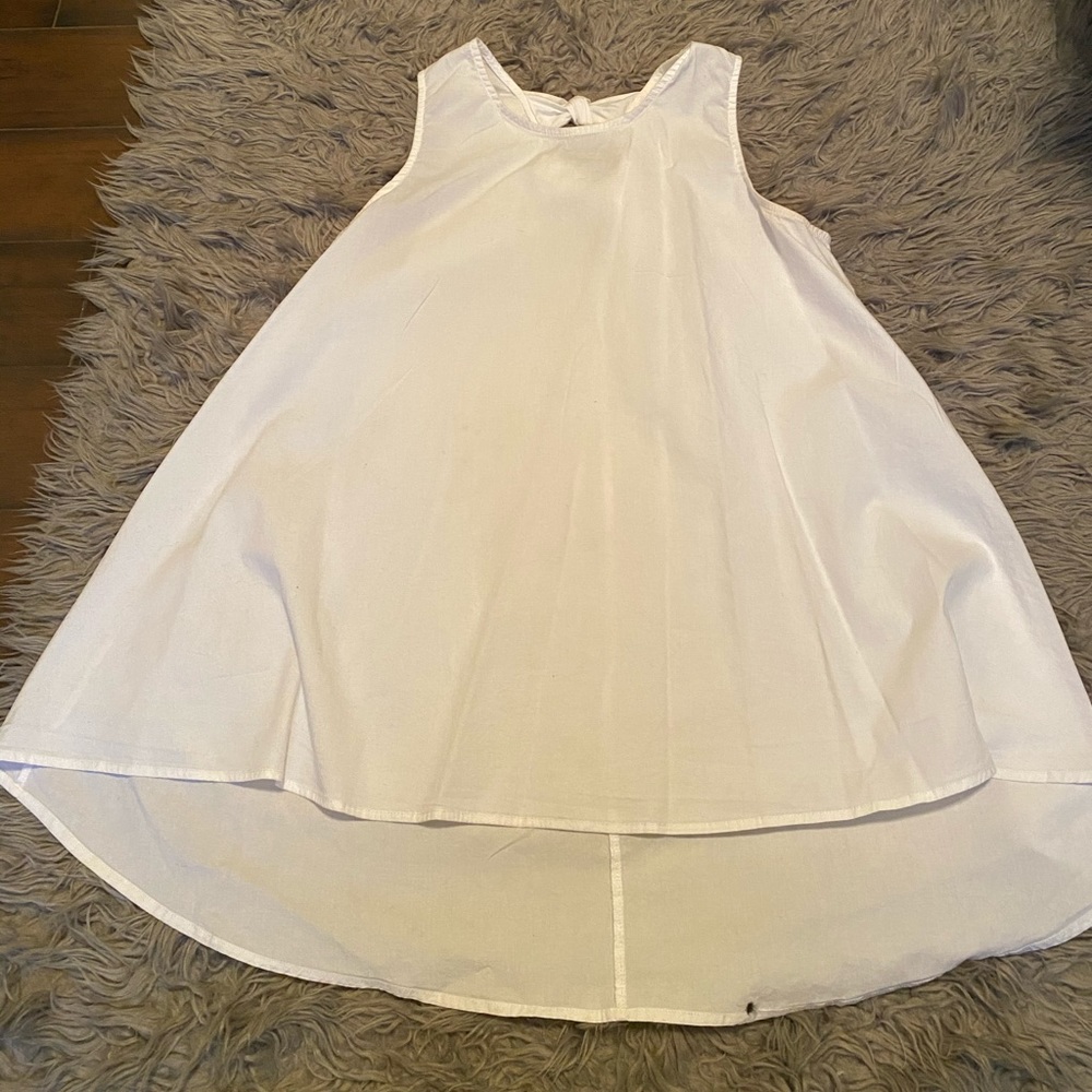 White sleeveless tunic with Bows on back
